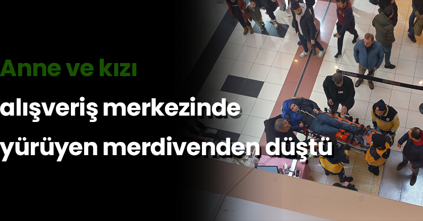 Anne ve kızı alışveriş merkezinde yürüyen merdivenden düştü