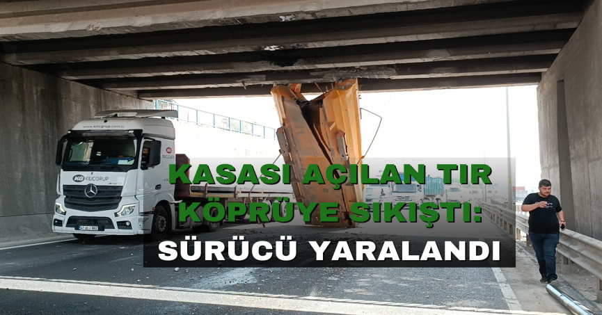 Kasası açılan tır köprüye sıkıştı: Sürücü yaralandı