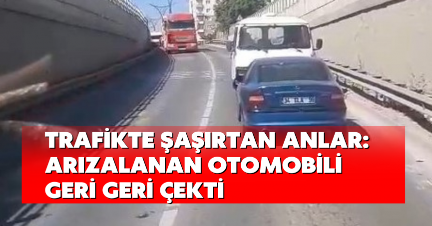 Trafikte şaşırtan anlar: Arızalanan otomobili geri geri çekti